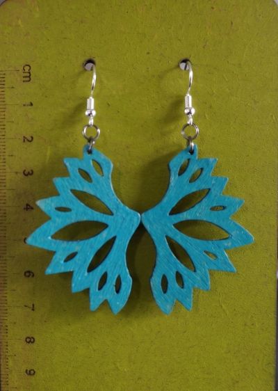 Boucles turquoises en forme d'ailes