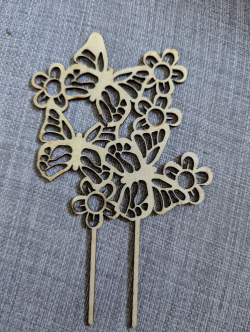 Pique plante en bois sculpté
