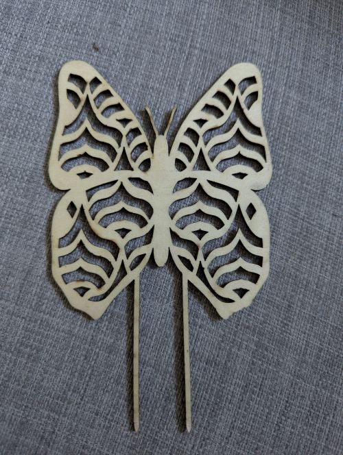 Pique plante en bois sculpté